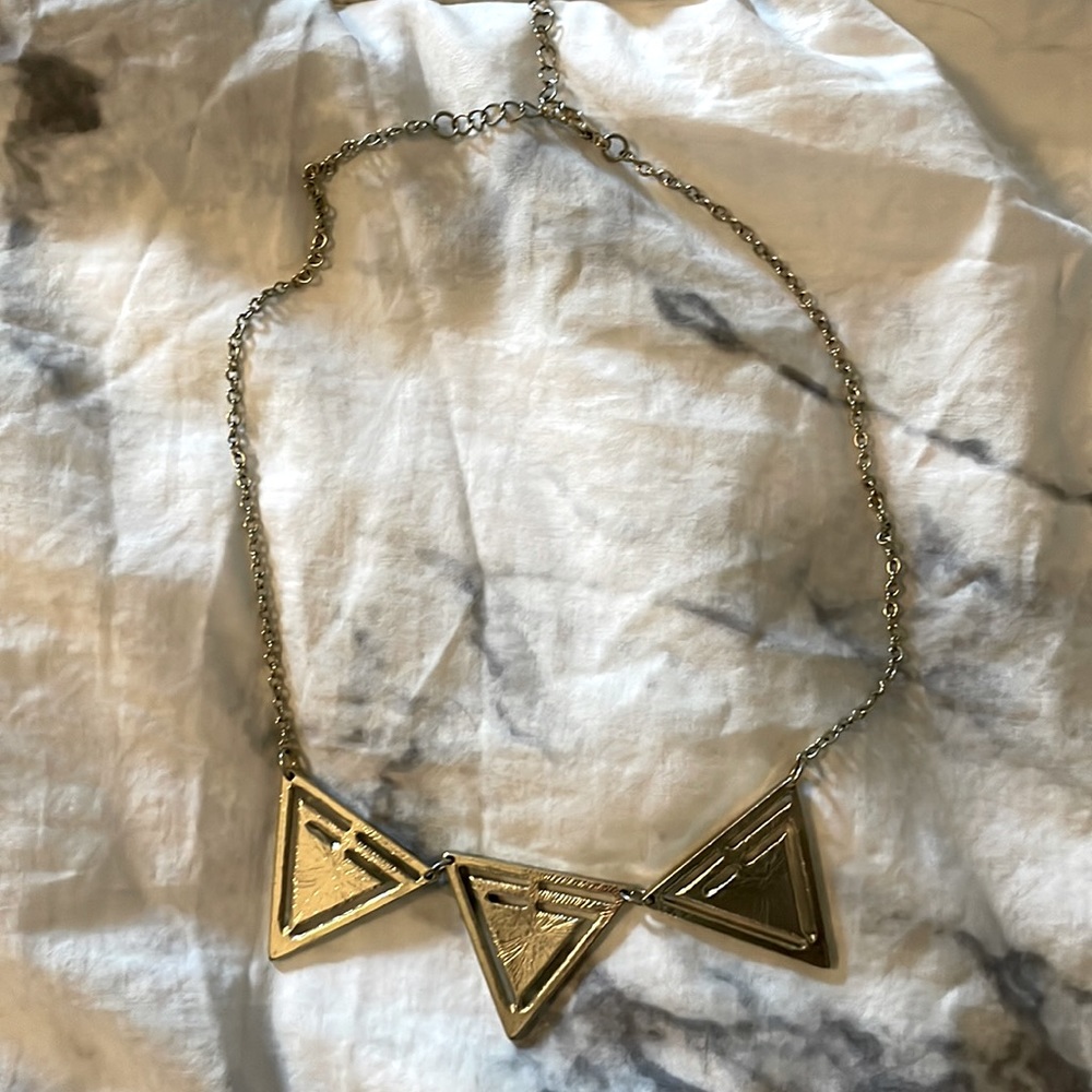 Gold tone geometric necklace